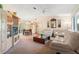 Open living space with comfortable seating, a dining area, and built-ins at 4345 Union Springs Rd, Spring Hill, FL 34608