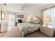 Main bedroom with king-size bed, nightstands, and a dresser at 4345 Union Springs Rd, Spring Hill, FL 34608
