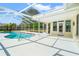 Inviting screened pool and patio area with plenty of space for relaxation at 4345 Union Springs Rd, Spring Hill, FL 34608