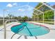 Refreshing pool area with a screened enclosure at 4345 Union Springs Rd, Spring Hill, FL 34608
