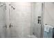 Walk-in shower with gray tile and glass enclosure at 5426 Rushmere Ct, Palmetto, FL 34221