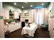 Relaxing spa room with massage table and other amenities at 5426 Rushmere Ct, Palmetto, FL 34221