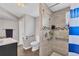 Updated bathroom with walk-in shower, toilet and grab bars at 5715 20Th W St, Bradenton, FL 34207