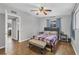 Relaxing bedroom with a bed, bench, and access to another bathroom at 5715 20Th W St, Bradenton, FL 34207