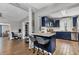 Updated kitchen featuring dark blue cabinetry and stainless steel appliances at 5715 20Th W St, Bradenton, FL 34207