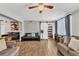 Open living area with a barn door leading to the bathroom and comfortable seating at 5715 20Th W St, Bradenton, FL 34207