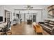 Spacious living area with hardwood floors, open concept layout, and dining area at 5715 20Th W St, Bradenton, FL 34207