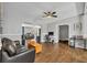 Open living space with hardwood floors, comfortable seating, and home office at 5715 20Th W St, Bradenton, FL 34207