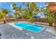 Relaxing pool area with patio and tropical plants at 5715 20Th W St, Bradenton, FL 34207