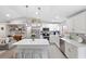 Modern kitchen with white cabinets, stainless steel appliances, and an island at 6233 Florida E Cir, Apollo Beach, FL 33572