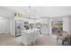 Bright kitchen, featuring stainless steel appliances and white cabinets at 6233 Florida E Cir, Apollo Beach, FL 33572