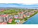Beautiful aerial shot of waterfront condos, green golf course and stunning bay views at 6322 Palma Del Mar S Blvd # 209, St Petersburg, FL 33715