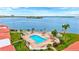 Stunning aerial view of the pool and beach overlooking the bay in this waterfront community at 6322 Palma Del Mar S Blvd # 209, St Petersburg, FL 33715