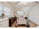 Bedroom with white built-ins and a light purple comforter at 6388 21St N Ave, St Petersburg, FL 33710