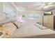 Spacious bedroom with king-size bed and large windows at 6388 21St N Ave, St Petersburg, FL 33710