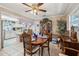 Open concept dining room adjacent to kitchen, featuring a wooden table and chairs at 6388 21St N Ave, St Petersburg, FL 33710