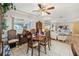 Dining room with table and chairs, open to living room and kitchen at 6388 21St N Ave, St Petersburg, FL 33710