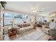 Bright and airy Gathering room with comfortable seating and access to the backyard at 6388 21St N Ave, St Petersburg, FL 33710