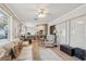 Open concept Gathering room with a view of the kitchen and comfortable seating at 6388 21St N Ave, St Petersburg, FL 33710