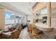 Kitchen with breakfast bar and view into living room at 6388 21St N Ave, St Petersburg, FL 33710
