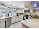 Bright kitchen with stainless steel appliances and ample counter space at 6388 21St N Ave, St Petersburg, FL 33710
