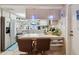 Kitchen features stainless steel appliances and an island with seating at 6388 21St N Ave, St Petersburg, FL 33710