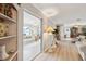 Open living room with hardwood floors and access to sunroom at 6388 21St N Ave, St Petersburg, FL 33710