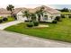 Single-Gathering home with lush landscaping at 6769 Greenview Ln, Englewood, FL 34224