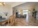 Spacious living room with tile floors and neutral colors at 6769 Greenview Ln, Englewood, FL 34224