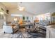 Relaxing living room with leather furniture and area rug at 6769 Greenview Ln, Englewood, FL 34224