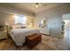 Bright main bedroom, featuring a ceiling fan and lots of natural light at 6769 Greenview Ln, Englewood, FL 34224