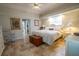 Spacious main bedroom with ample natural light and ceiling fan at 6769 Greenview Ln, Englewood, FL 34224