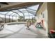 Enclosed pool and spa area with screened lanai at 6769 Greenview Ln, Englewood, FL 34224