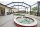 Enclosed pool and spa with screened lanai at 6769 Greenview Ln, Englewood, FL 34224