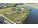 Aerial view showing community amenities including pool and tennis courts at 7401 Paradiso Dr, Apollo Beach, FL 33572