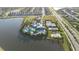 Aerial view of community with lake and resort-style amenities at 7401 Paradiso Dr, Apollo Beach, FL 33572