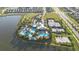 Community pool, tennis courts, and surrounding homes at 7401 Paradiso Dr, Apollo Beach, FL 33572
