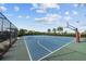 Outdoor basketball court with a hoop and fence at 7401 Paradiso Dr, Apollo Beach, FL 33572