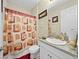 Small bathroom with granite vanity and shower/tub combo at 7401 Paradiso Dr, Apollo Beach, FL 33572
