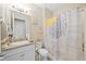 Clean bathroom with granite vanity and a shower/tub combo at 7401 Paradiso Dr, Apollo Beach, FL 33572