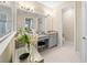 Bathroom with granite vanity and tiled floors at 7401 Paradiso Dr, Apollo Beach, FL 33572