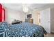 Bright bedroom with double bed and built-in desk at 7401 Paradiso Dr, Apollo Beach, FL 33572
