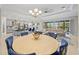 Bright dining room with seating for six and kitchen views at 7401 Paradiso Dr, Apollo Beach, FL 33572