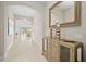 Bright entryway with tile floors and a decorative console table at 7401 Paradiso Dr, Apollo Beach, FL 33572
