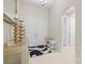 Bright and spacious entryway with double doors and decorative accents at 7401 Paradiso Dr, Apollo Beach, FL 33572