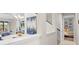 Open hallway with view into bedroom and living areas at 7401 Paradiso Dr, Apollo Beach, FL 33572