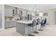 Modern kitchen with gray cabinets and large island at 7401 Paradiso Dr, Apollo Beach, FL 33572