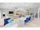Open floor plan with kitchen, living room and breakfast bar at 7401 Paradiso Dr, Apollo Beach, FL 33572