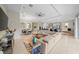Open floor plan with living, kitchen, and dining areas at 7401 Paradiso Dr, Apollo Beach, FL 33572