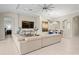 Large living room with sectional sofa and dining area at 7401 Paradiso Dr, Apollo Beach, FL 33572